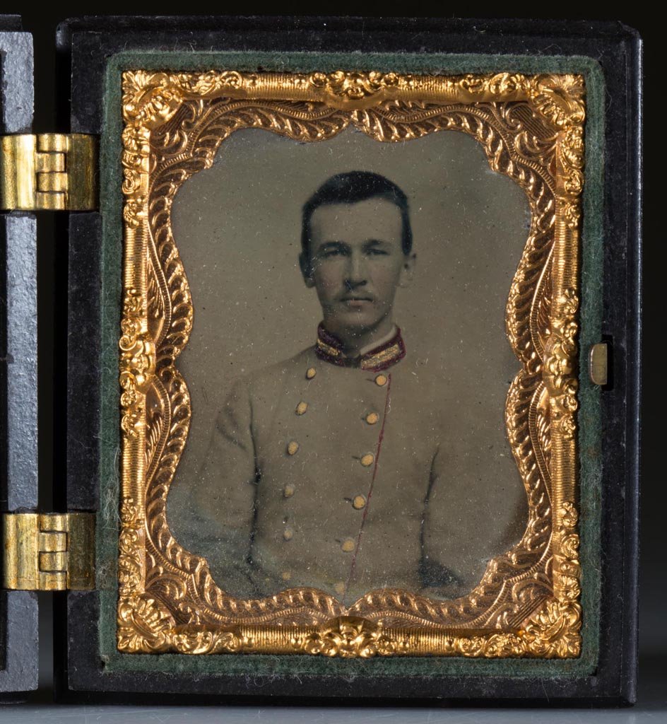 CIVIL WAR - CONFEDERATE SOLDIER NINTH-PLATE AMBROTYPE: CIVIL WAR - CONFEDERATE SOLDIER NINTH-PLATE AMBROTYPE, in jacket with red-colored and gilt highlights. Original fruit basket Union case. Probably Shenandoah Valley of Virginia. Third quarter 19th cent
