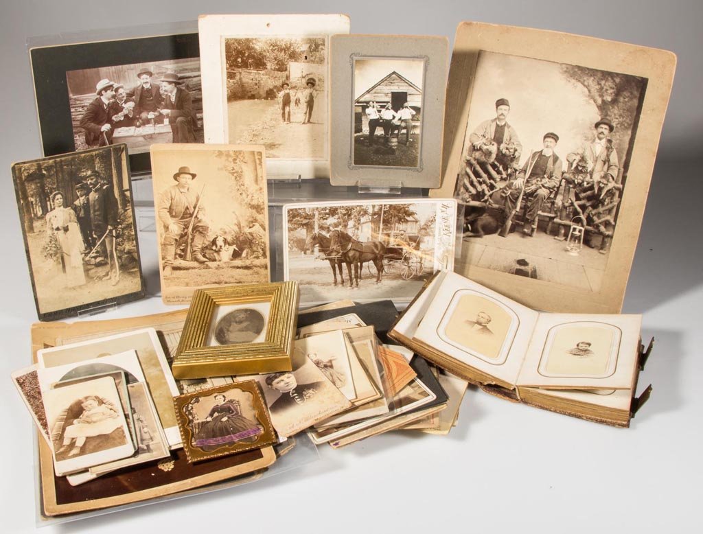 ASSORTED AMERICAN TOPICAL CABINET AND CDV CARDS: ASSORTED AMERICAN TOPICAL CABINET AND CDV CARDS, uncounted lot, including hunting, fishing, and card playing scenes, together with a small photographic album. Late 19th/early 20th century. 4" H x 2 1/