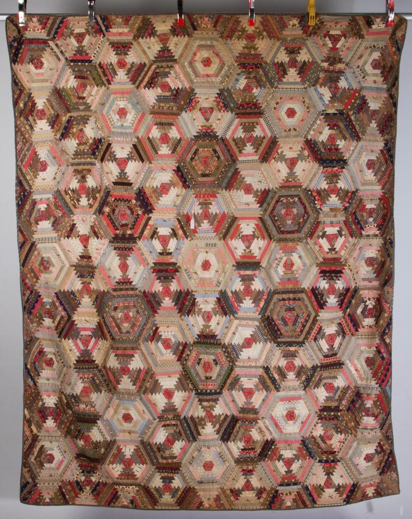SHENANDOAH VALLEY OF VIRGINIA REVERSIBLE "LOG CABIN /: SHENANDOAH VALLEY OF VIRGINIA REVERSIBLE "LOG CABIN / PATCHWORK" 1882 PIECED AND TIED QUILT, one side comprising 85 hexagonal blocks with multi-colored prints, hand stitched "1882 / ST", reverse with 