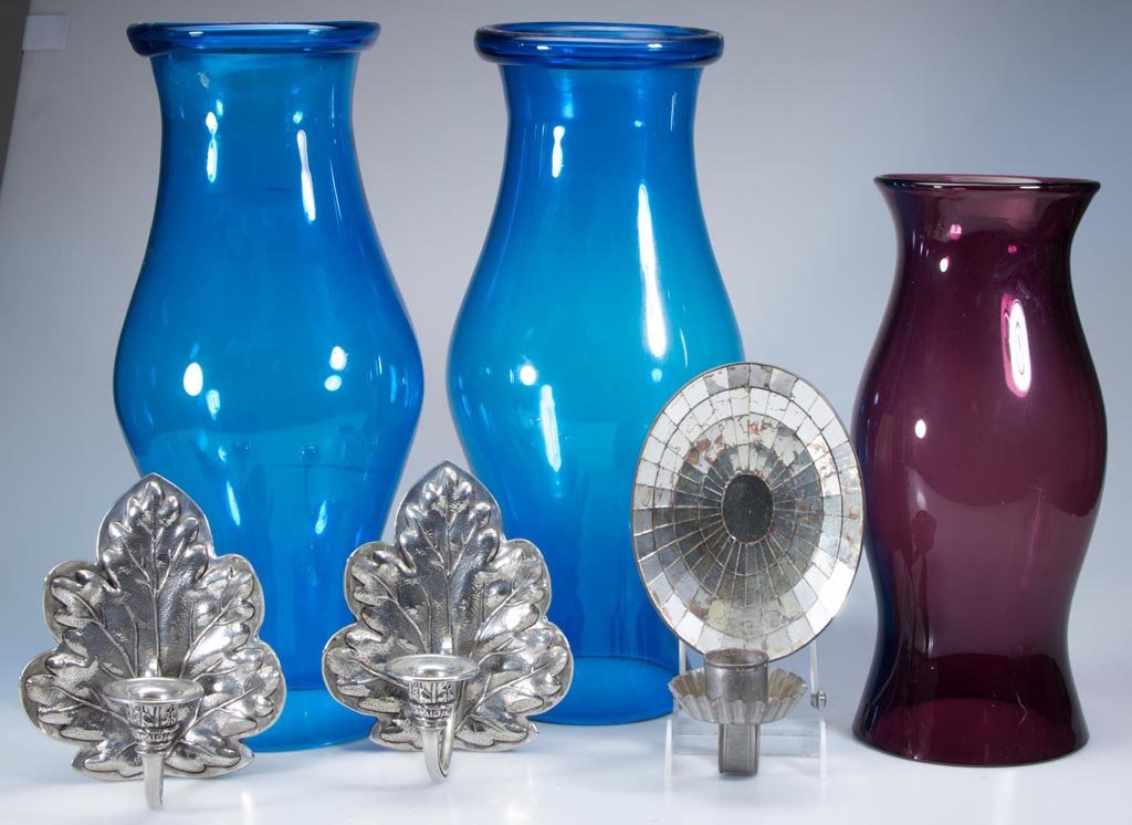 AMERICAN OR EUROPEAN CONTEMPORARY LIGHTING ACCESSORIES,: AMERICAN OR EUROPEAN CONTEMPORARY LIGHTING ACCESSORIES, LOT OF SIX, comprising three colored glass hurricane shades, a pair of silver-plate leaf-form sconces, and a reproduction tin mirrored sconce. L