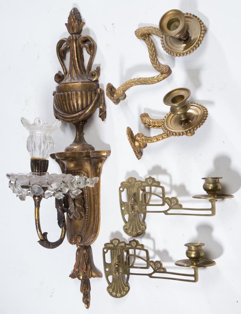 AMERICAN OR EUROPEAN ASSORTED LIGHTING ACCESSORIES, LOT: AMERICAN OR EUROPEAN ASSORTED LIGHTING ACCESSORIES, LOT OF FIVE, including a large wall sconce and two pairs of brass wall-mounted candleholders on swiveling arms. 20th century. 4" HOA, 2" WOA, 8" DOA