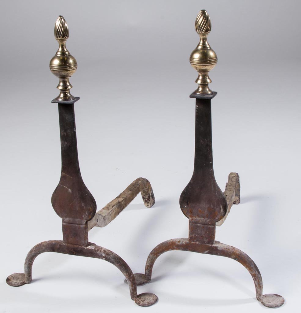WROUGHT-IRON AND BRASS PAIR OF ANDIRONS: WROUGHT-IRON AND BRASS PAIR OF ANDIRONS, spiral and ringed ball finials, large penny feet. 19th or possibly early 20th century. 20 1/2" H, 16" D. Provenance: From a Virginia private collection.