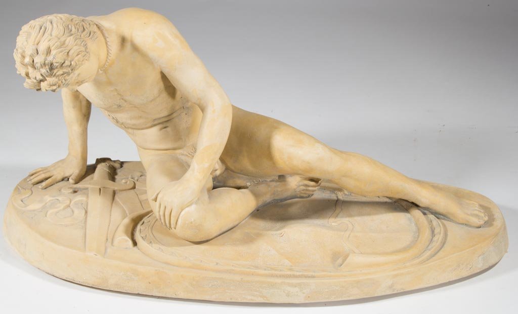 AMERICAN OR EUROPEAN PLASTER STATUE: AMERICAN OR EUROPEAN PLASTER STATUE, depicting a nude reclining male on decorative oblong base. 19th/20th century. 14" HOA, 28 1/2" WOA, 12" DOA. Provenance: Collection of the late Margaret "Maggie" a