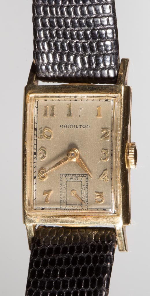 VINTAGE HAMILTON WATCH CO. 14K GOLD CASE MAN'S WRIST: VINTAGE HAMILTON WATCH CO. 14K GOLD CASE MAN'S WRIST WATCH, 19-jewel "982" movement, serial #M44075, case marked, modern band. First half 20th century. 1" x 3/4" case. Provenance: Collection of the la