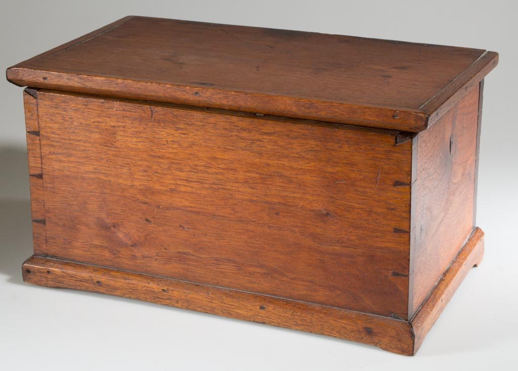SHENANDOAH VALLEY OF VIRGINIA WALNUT MINIATURE BLANKET: SHENANDOAH VALLEY OF VIRGINIA WALNUT MINIATURE BLANKET CHEST, hinged lid with applied moldings above a finely dovetailed box with divided interior, raised on applied bracket foot. Yellow pine and popl