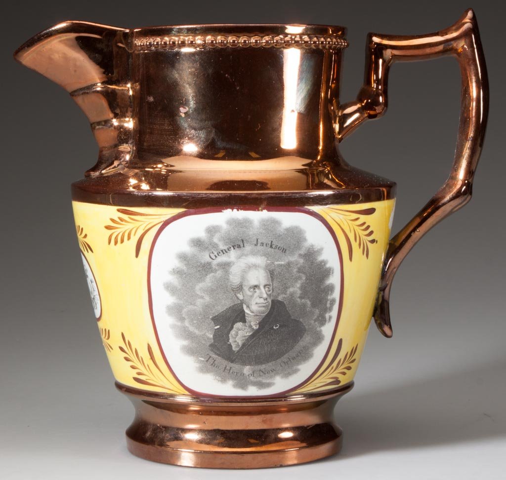 ENGLISH STAFFORDSHIRE COPPER LUSTER ANDREW JACKSON: ENGLISH STAFFORDSHIRE COPPER LUSTER ANDREW JACKSON COMMEMORATIVE PITCHER, the plain neck over a straight-cylindrical tapering body, on a low foot, the waist painted with a broad yellow-ground band, en