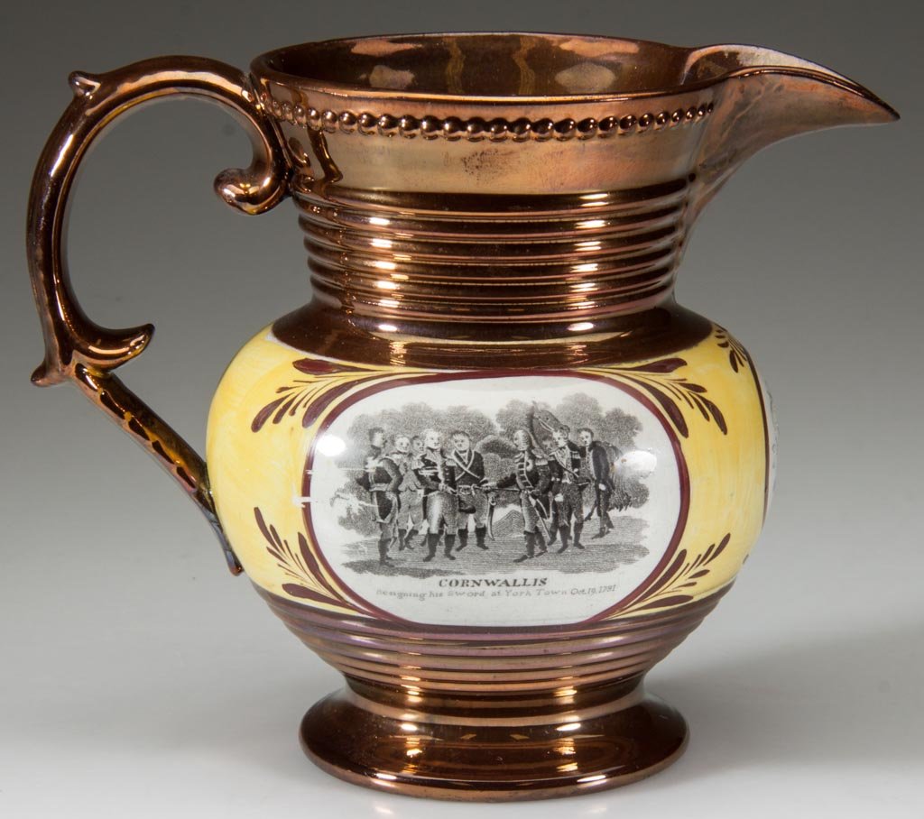 ENGLISH STAFFORDSHIRE COPPER LUSTER POTTERY AMERICAN: ENGLISH STAFFORDSHIRE COPPER LUSTER POTTERY AMERICAN "LAFAYETTE" AND "CORNWALLIS" COMMEMORATIVE PITCHER, with wide spout over ribbed neck above a globular waist with yellow-ground band, with copper lu
