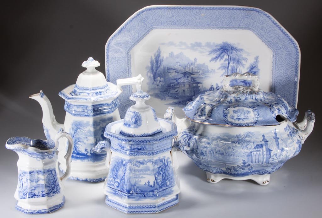 ENGLISH STAFFORDSHIRE IRONSTONE AND BONE CHINA: ENGLISH STAFFORDSHIRE IRONSTONE AND BONE CHINA TRANSFER-PRINTED TABLE ARTICLES, LOT OF FIVE, including a Ridgeway's "Oriental" pattern soup tureen and cover, a canted-cornered platter, a teapot, cover