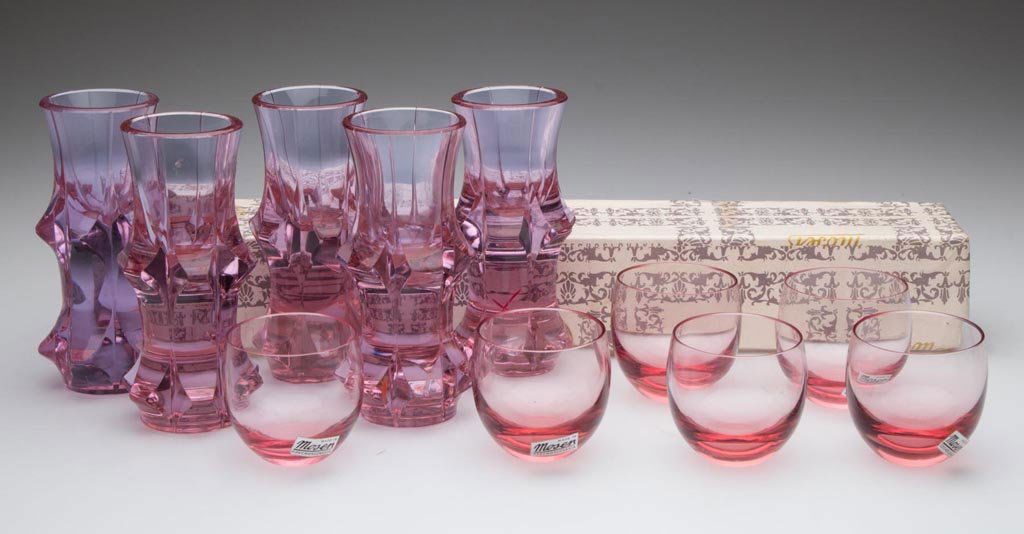 MOSER COLORED DRINKING VESSELS, LOT OF 11: MOSER COLORED DRINKING VESSELS, LOT OF 11, comprising a set of five Alexandrite thick-base shot glasses, each with acid signature under base, and a set of six pink liqour glasses in original box, thre