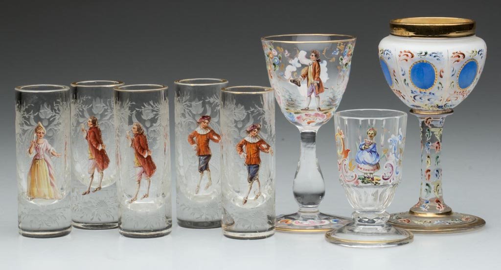 BOHEMIAN ENAMELED DRINKING VESSELS, LOT OF EIGHT: BOHEMIAN ENAMELED DRINKING VESSELS, LOT OF EIGHT, colorless with polychrome decoration, comprising five shot glasses with elaborate engravings, one footed tumbler, and one cordial, each with a single 