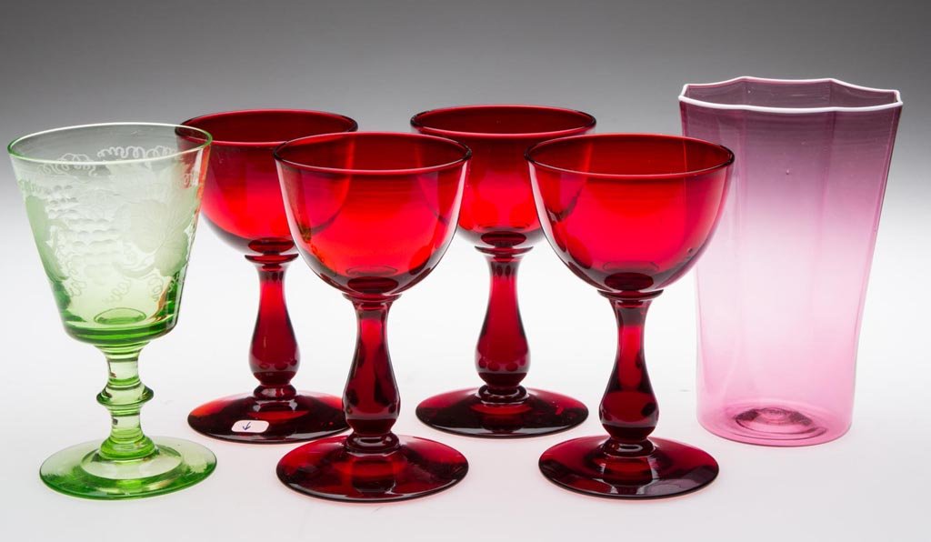 ASSORTED AMERICAN DRINKING VESSELS, LOT OF SIX: ASSORTED AMERICAN DRINKING VESSELS, LOT OF SIX, comprising a set of four deep ruby cocktail glasses signed "HAWKES" on top of foot rim, each with polished pontil mark, blank possibly by Steuben; a Pai