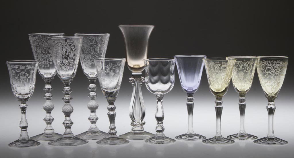 ASSORTED CAMBRIDGE AND FOSTORIA CORDIALS, LOT OF 11: ASSORTED CAMBRIDGE AND FOSTORIA CORDIALS, LOT OF 11, colored and colorless, one Alexandrite, Cambridge includes three Diane, Fostoria includes two Versailles, June, Chintz, and Navarre. 20th century.