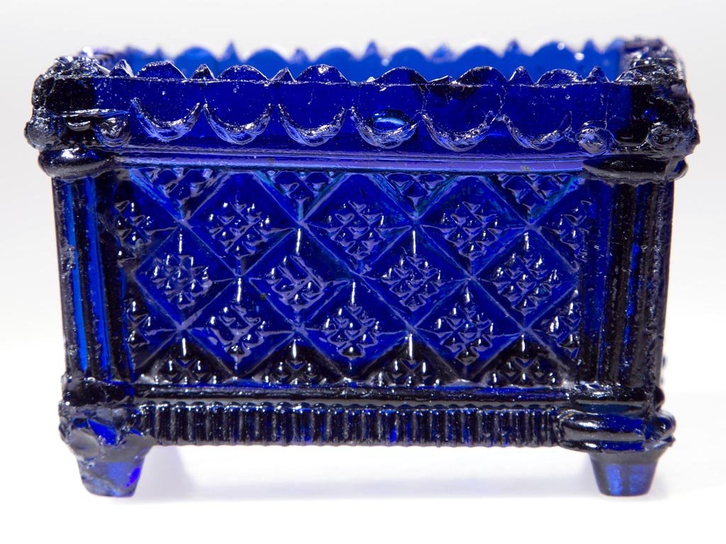 SD-7 STRAWBERRY DIAMOND PRESSED OPEN SALT: SD-7 STRAWBERRY DIAMOND PRESSED OPEN SALT, deep cobalt blue, scallop and point rim. Scarce. Boston & Sandwich Glass Co. 1827-1840. 2" H, 2 1/8" x 2 7/8". Literature: Neal, p. 449. Spillman - Corning, 