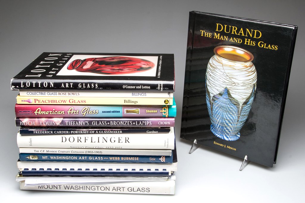 AMERICAN ART GLASS REFERENCE VOLUMES, LOT OF 16: AMERICAN ART GLASS REFERENCE VOLUMES, LOT OF 16, including Mt. Washington, Pairpoint, Lotton, Dorflinger, Durand, Steuben, Tiffany, etc. Hard and soft covers, several in facsimile. Provenance: Collect
