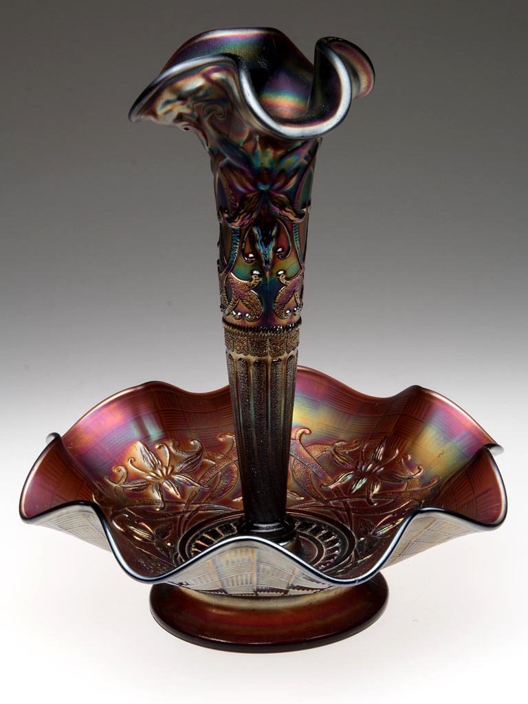 NORTHWOOD WISHBONE CARNIVAL GLASS EPERGNE: NORTHWOOD WISHBONE CARNIVAL GLASS EPERGNE, amethyst, single lily, ruffled-rim bowl with basketweave pattern to exterior. Northwood Glass Co. First quarter 20th century. 9 1/2" HOA, bowl 3 7/8" HOA, 8"