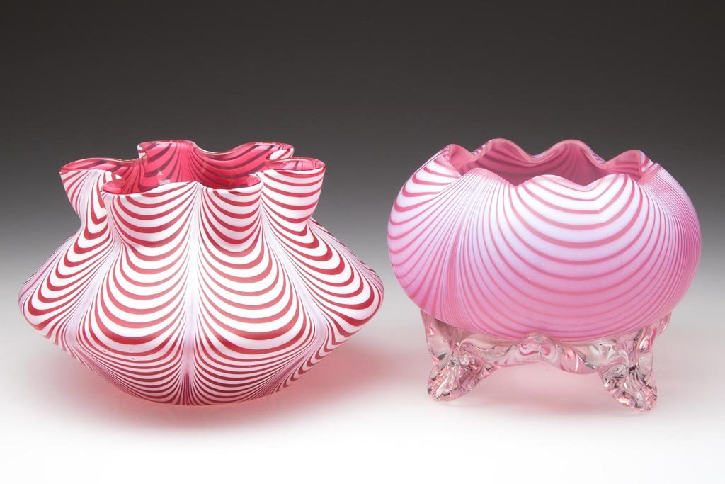 NAILSEA / VENETIAN THREAD FAIRY LAMP BASES, LOT OF TWO: NAILSEA / VENETIAN THREAD FAIRY LAMP BASES, LOT OF TWO, opal loops on ruby, satin finish, including an example raised on three colorless applied feet. Fourth quarter 19th century. 3 1/2" and 3 1/4" HO