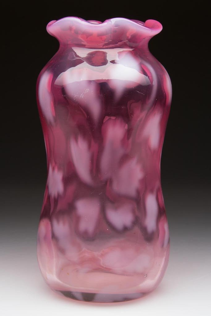 UNIDENTIFIED FLORAL PATTERN VASE: UNIDENTIFIED FLORAL PATTERN VASE, rubina opalescent, with scalloped rim and polished pontil mark. Late 19th/early 20th century. 5 1/4" H. Provenance: From the collection of Larry & Diana Nellans.
