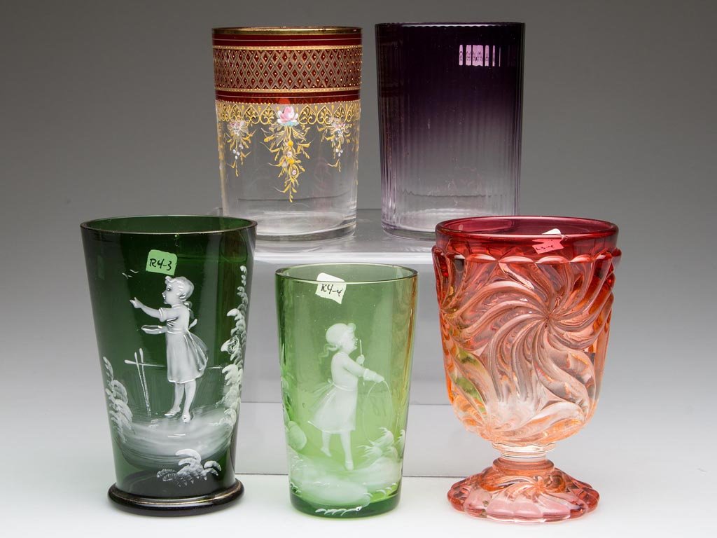 ASSORTED EUROPEAN GLASS TUMBLERS, LOT OF FIVE: ASSORTED EUROPEAN GLASS TUMBLERS, LOT OF FIVE, including a Baccarat Rose Tiente Pinwheel footed example and two green so-called Mary Gregory decorated, one with 1893 World's Fair inscription. Fourth q