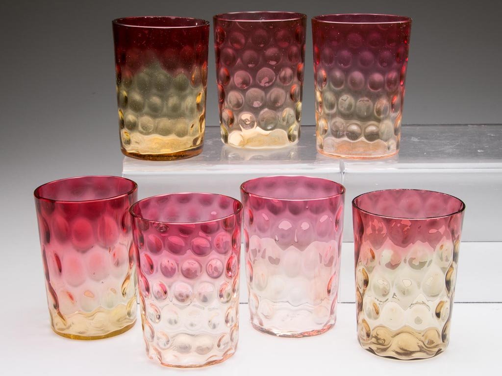 ASSORTED DOT-OPTIC PATTERN TUMBLERS, LOT OF SEVEN: ASSORTED DOT-OPTIC PATTERN TUMBLERS, LOT OF SEVEN, differing shades of rubina. Fourth quarter 19th century. 3 3/4" H. Provenance: Property of the Estate of Cheryl M. Kelley, of Myrtle Beach, SC.