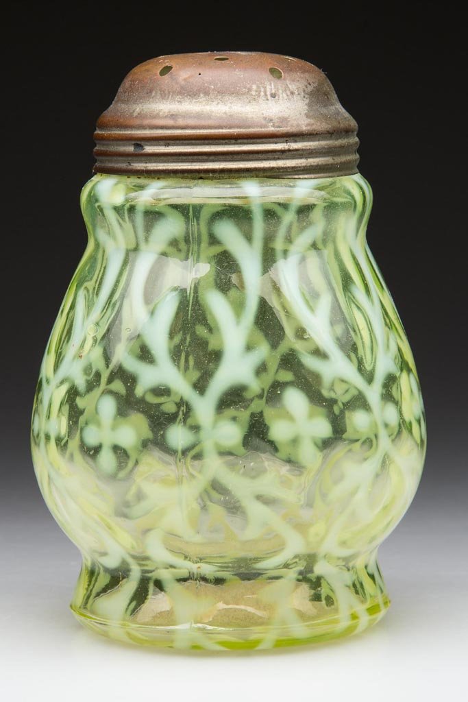 OPALINE BROCADE / SPANISH LACE - WIDE-WAIST SUGAR: OPALINE BROCADE / SPANISH LACE - WIDE-WAIST SUGAR SHAKER, vaseline (uranium) opalescent, period lid. Northwood Glass Co. Fourth quarter 19th century. 4 1/2" HOA. Provenance: Collection of Jessie and t