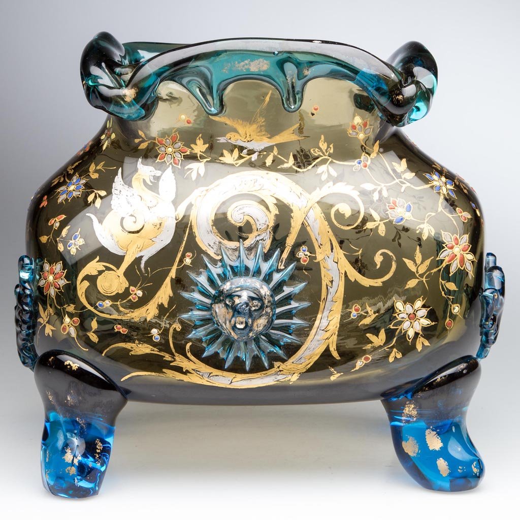STEVENS AND WILLIAMS VICTORIAN DECORATED LARGE CENTER: STEVENS AND WILLIAMS VICTORIAN DECORATED LARGE CENTER VASE, smoky amber and blue, heavy block-like body with applied free-form rim, lion masks and feathered-wing-like ornaments, gilt and polychrome-en