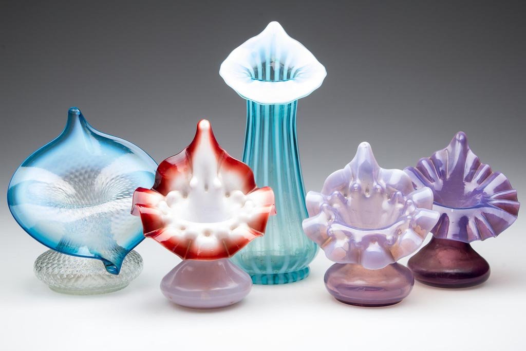 ASSORTED VICTORIAN GLASS JACK-IN-THE-PULPIT VASES, LOT: ASSORTED VICTORIAN GLASS JACK-IN-THE-PULPIT VASES, LOT OF FIVE, various colors, comprising one cased example and four opalescent examples, four with rough pontil mark. Late 19th/early 20th century. 4 