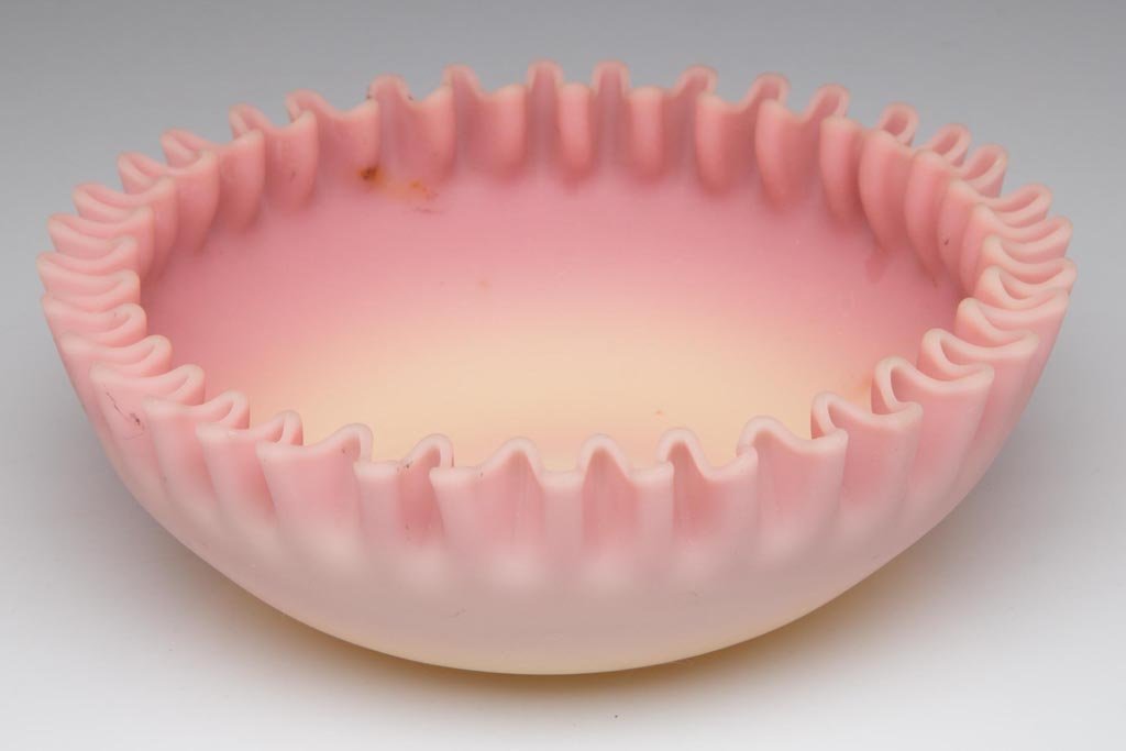 MT. WASHINGTON BURMESE NAPPY: MT. WASHINGTON BURMESE NAPPY, plush finish, tightly crimped rim, ground pontil mark. Mt. Washington Glass Co. Circa 1885-1895. 1 1/2" H, 4 5/8" D. Provenance: From a Cape Cod Estate collection.