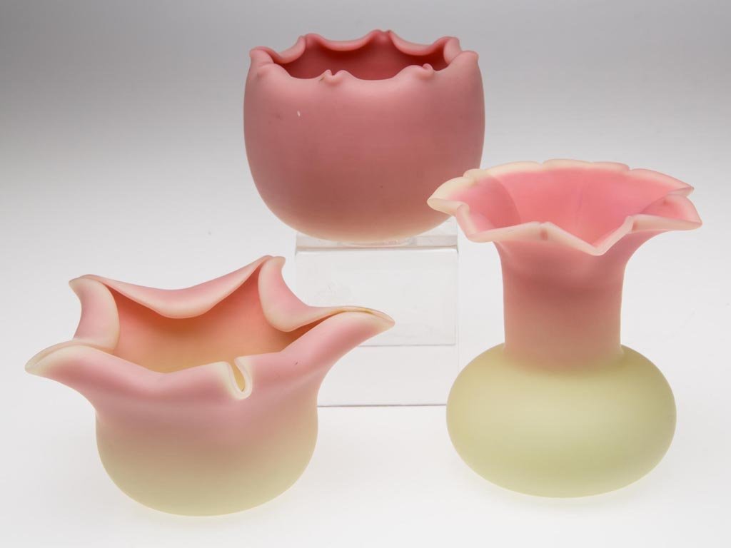 WEBB BURMESE CABINET VASES, LOT OF THREE: WEBB BURMESE CABINET VASES, LOT OF THREE, plush finish, undecorated, each with crimped rim and "QUEEN'S BURMESEWARE" acid stamp in the polished pontil mark. Thomas Webb & Sons. Circa 1886-1895. 2 1/8"