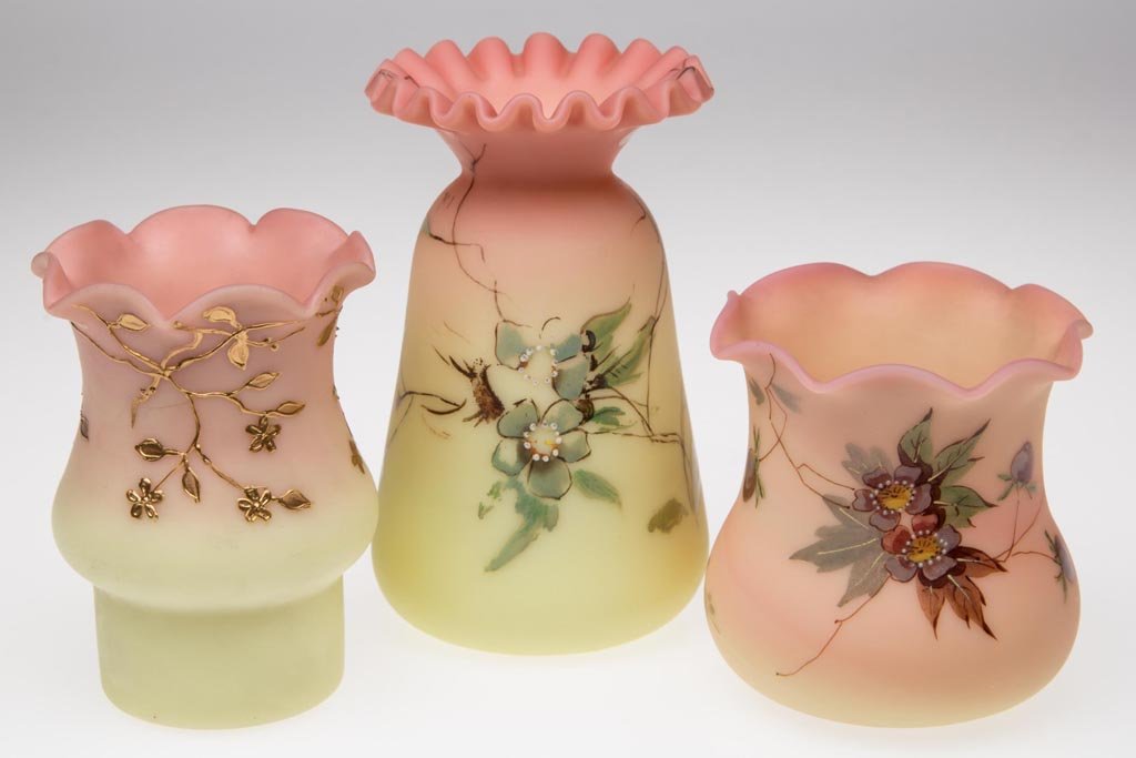 WEBB DECORATED BURMESE CABINET VASES, LOT OF THREE: WEBB DECORATED BURMESE CABINET VASES, LOT OF THREE, plush finish, each with crimped rim, various polychrome and gilt decorations, each with polished pontil mark. Thomas Webb & Sons. Circa 1886-1895. 2