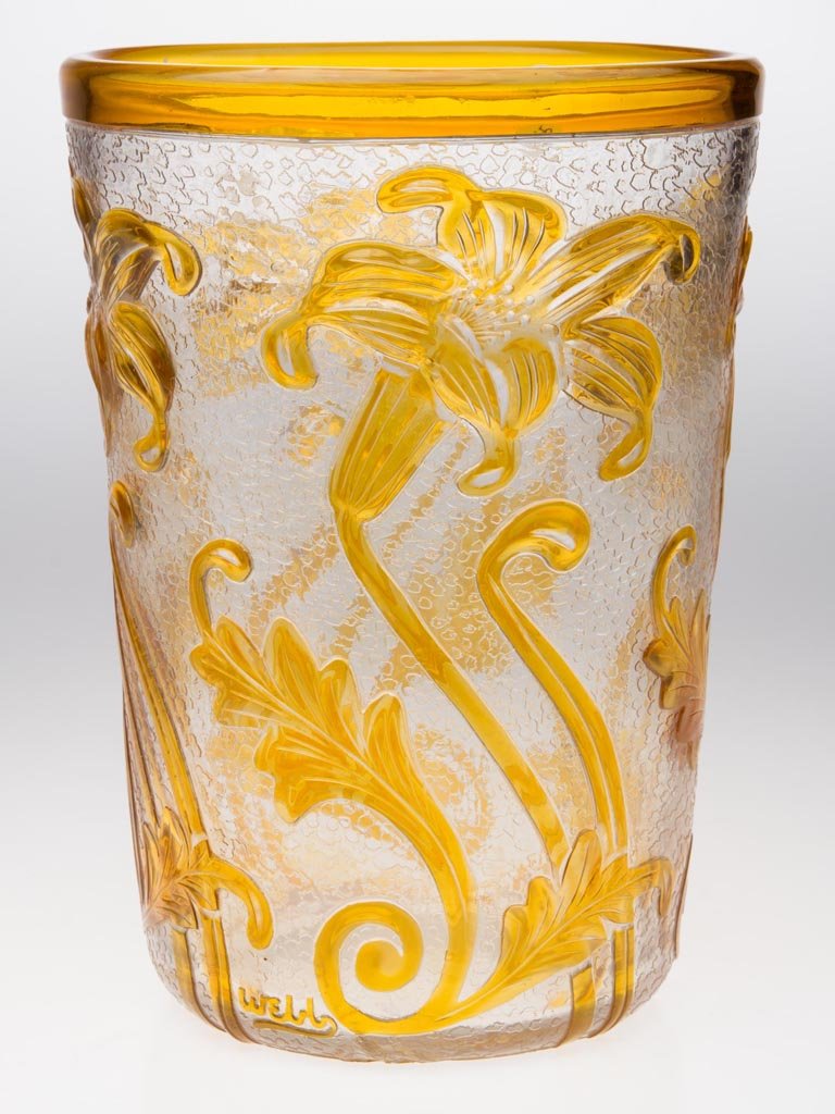 WEBB ENGLISH CAMEO VASE: WEBB ENGLISH CAMEO VASE, yellow amber to colorless, slightly tapered form with acid cut-back and engraved Art Nouveau lily decoration on a textured ground, cameo "Webb" script signature at base, polis