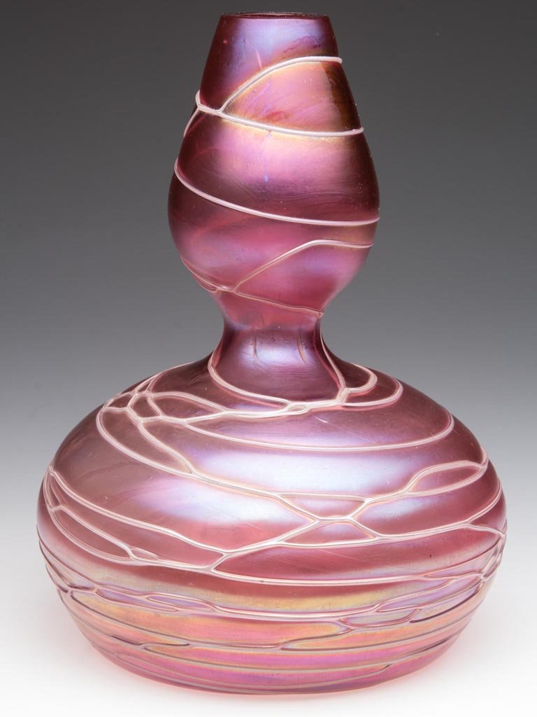 LOETZ-TYPE BOHEMIAN VASE: LOETZ-TYPE BOHEMIAN VASE, pink iridescent with random applied opal threads, double-gourd form with factory polished mouth. Probably Pallme-Konig. Circa 1900. 8 1/4" H.