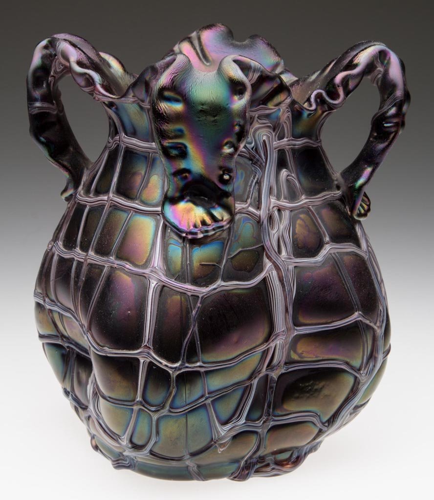 LOETZ-TYPE BOHEMIAN VASE: LOETZ-TYPE BOHEMIAN VASE, deep red / purple iridescent with random applied amethyst-striped opal threads, square grotesque form with four-part folded-over rim, pinched sides, and polished pontil mark.