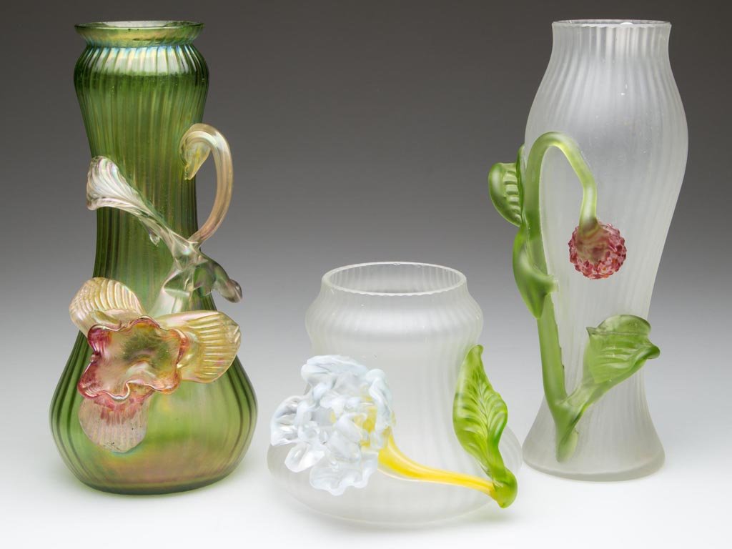 LOETZ-TYPE BOHEMIAN VASES, LOT OF THREE: LOETZ-TYPE BOHEMIAN VASES, LOT OF THREE, colorless and green iridescent, each ribbed body with applied decorations and polished rim. First quarter 20th century. 3 3/4" to 8" H. Provenance: Collection