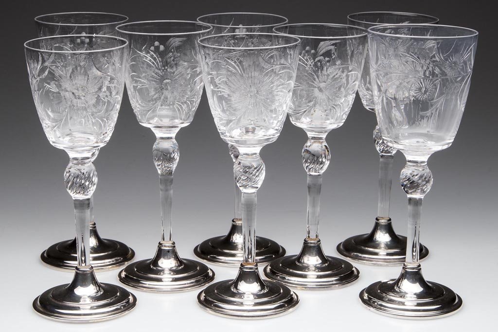 PAIRPOINT FINE ARTS LINE STEMWARE, LOT OF EIGHT: PAIRPOINT FINE ARTS LINE STEMWARE, LOT OF EIGHT, colorless, comprising seven engraved with the "Denmark" pattern and one engraved with the "Wellington" pattern, each raised on a tall stem with swirl-c