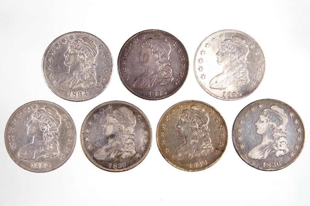 UNITED STATES SILVER CAPPED BUST HALF DOLLAR COINS, LOT: UNITED STATES SILVER CAPPED BUST HALF DOLLAR COINS, LOT OF SEVEN, 1834 large date small letters, 1835 (two), 1836, and 1836 (three variations). Provenance: Collection of the late John Palmer, Purcellv