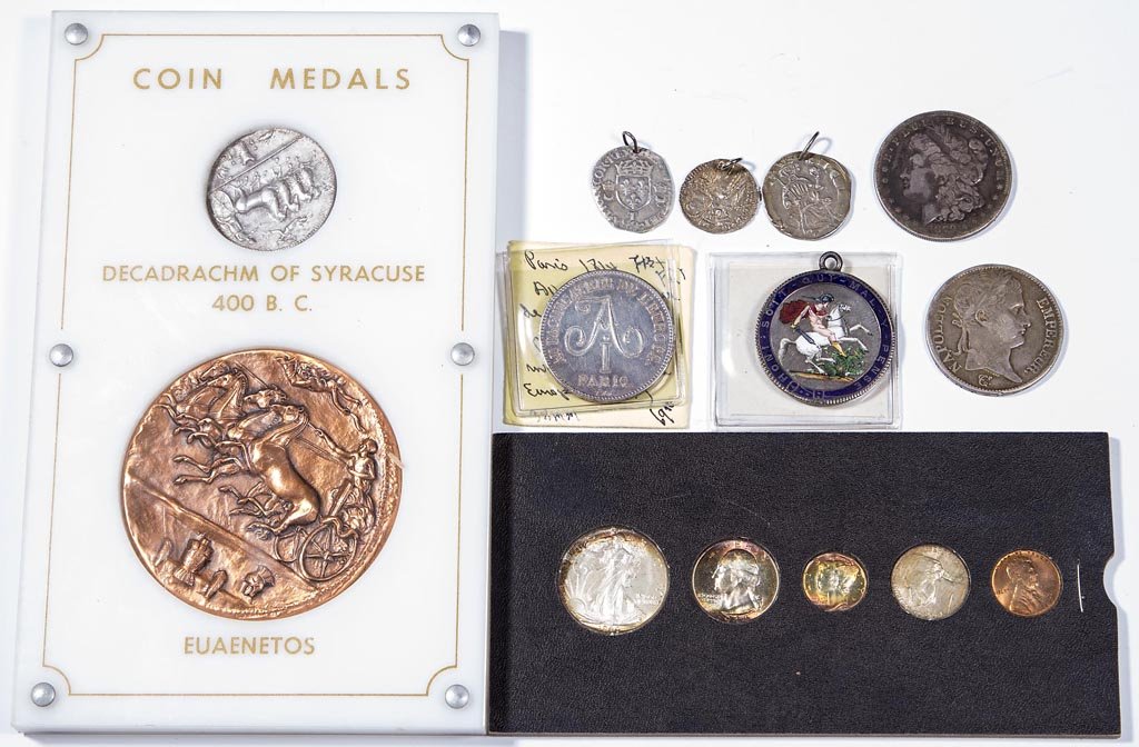 ASSORTED COINAGE AND RELATED ARTICLES: ASSORTED COINAGE AND RELATED ARTICLES, including an 1879-S US silver dollar, 1944-D US mint set, 1813-K France 5 Francs, 1818 England half crown with enameled obverse, several ancient-type coins, etc.