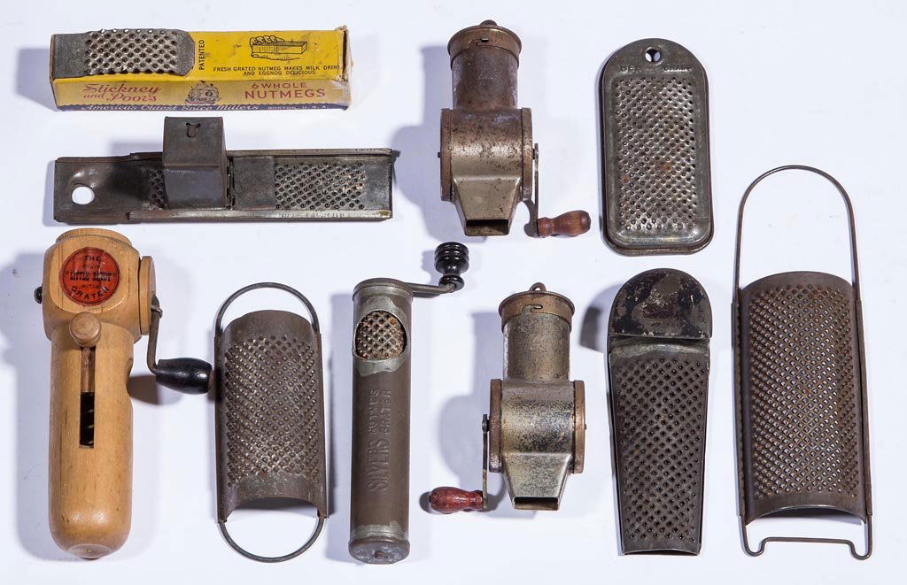 ASSORTED VINTAGE NUTMEG GRATERS, LOT OF TEN: ASSORTED VINTAGE NUTMEG GRATERS, LOT OF TEN, tin, wood, and cardboard, including The "Little Rhody", Stickney and Poor's, The "Boye", and Silvers. Late 19th/first half 20th century. 4" to 7 1/4" L. Pr