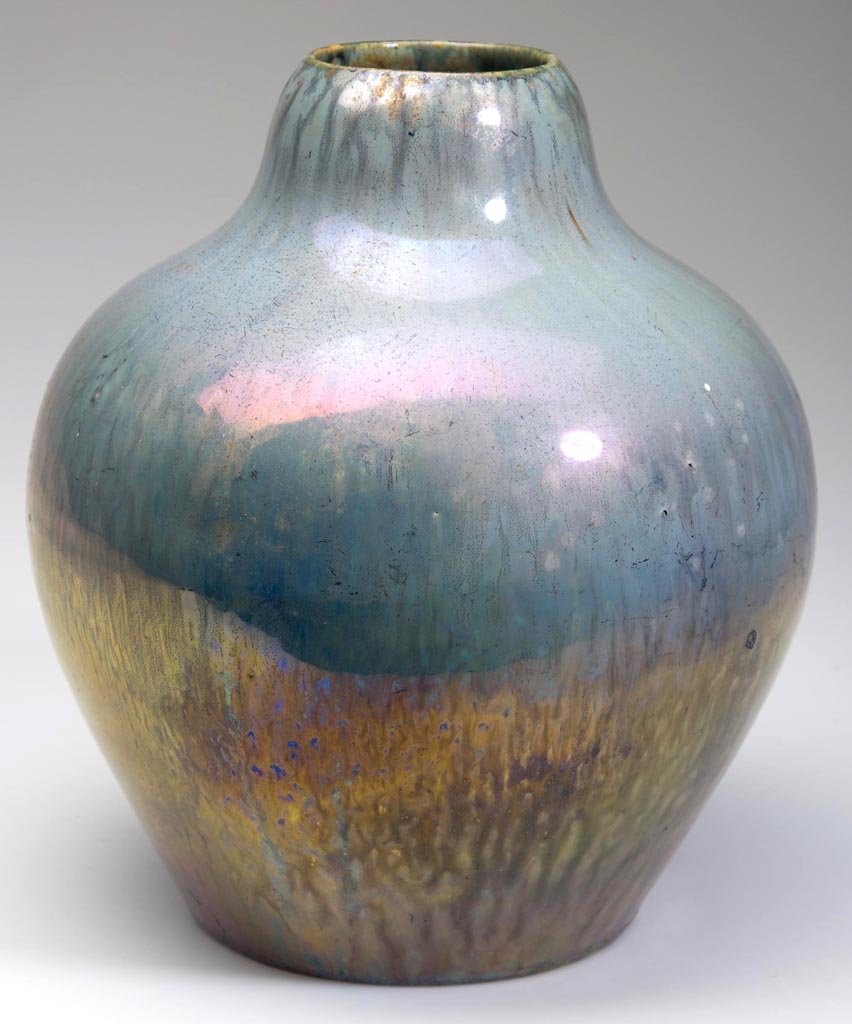 FRENCH ART POTTERY VASE: FRENCH ART POTTERY VASE, ovoid form with truncated neck and iridescent metallic glaze, two impressed marks under base include "FRANCE". First quarter 20th century. 8" H. Provenance: Property of a New
