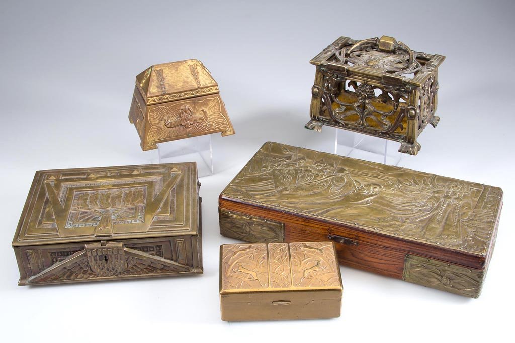 ASSORTED ART DECO AND ART NOUVEAU BOXES, LOT OF FIVE: ASSORTED ART DECO AND ART NOUVEAU BOXES, LOT OF FIVE, including an oak example with embossed brass top depicting an Arthurian fantasy scene, a brass openwork example with a lady on the lid, and a bras