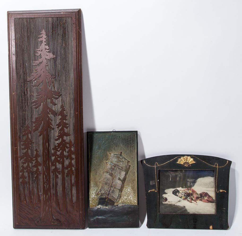 ASSORTED ARTS & CRAFTS ARTWORK, LOT OF THREE: ASSORTED ARTS & CRAFTS ARTWORK, LOT OF THREE, comprising a carved wooden panel depicting redwood trees, a carved and painted linoleum panel depicting a sailing ship, and a "In My Studio" print by Rudo