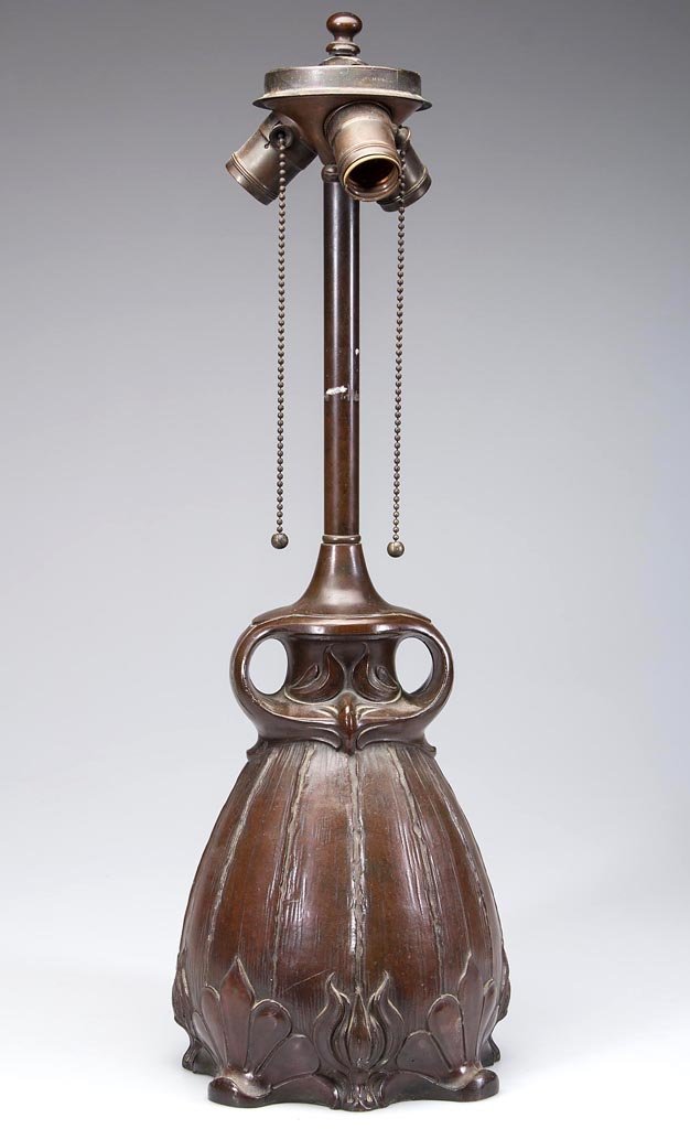 ARTS & CRAFTS BRONZE TABLE LAMP BASE: ARTS & CRAFTS BRONZE TABLE LAMP BASE, with three electric sockets, not signed. First quarter 20th century. 22 1/2" HOA.