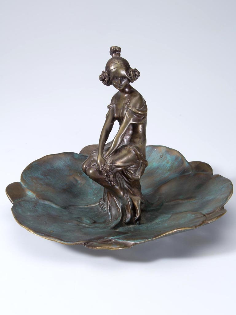 ART NOUVEAU STYLE BRONZE FIGURE: ART NOUVEAU STYLE BRONZE FIGURE, after Raoul Larche, depicting a young girl seated in the middle of a flower blossom, signed to underside. Second half 20th century. 7 1/2" H. Provenance: Collection of