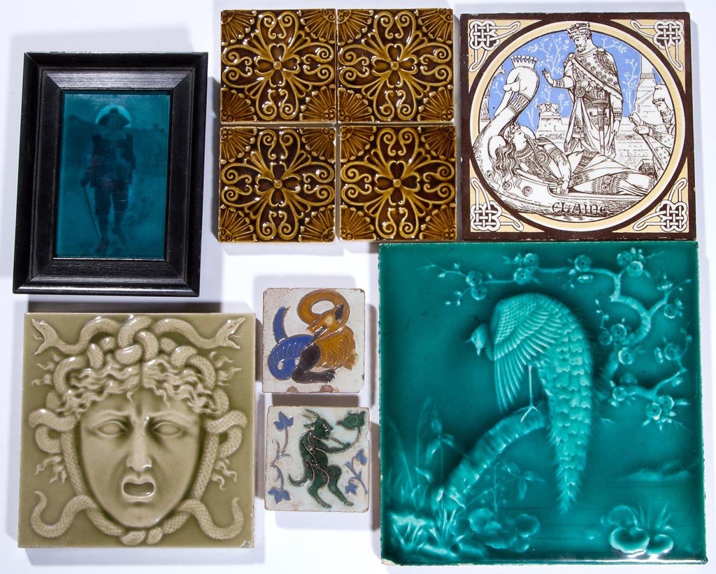 ASSORTED VICTORIAN AND ARTS & CRAFTS GLAZED CERAMIC: ASSORTED VICTORIAN AND ARTS & CRAFTS GLAZED CERAMIC TILES, LOT OF TEN, including a framed example depicting a Pilgrim, marked on verso for Robinson & Randle, NYC, a Medusa head and a Peacock, each mar