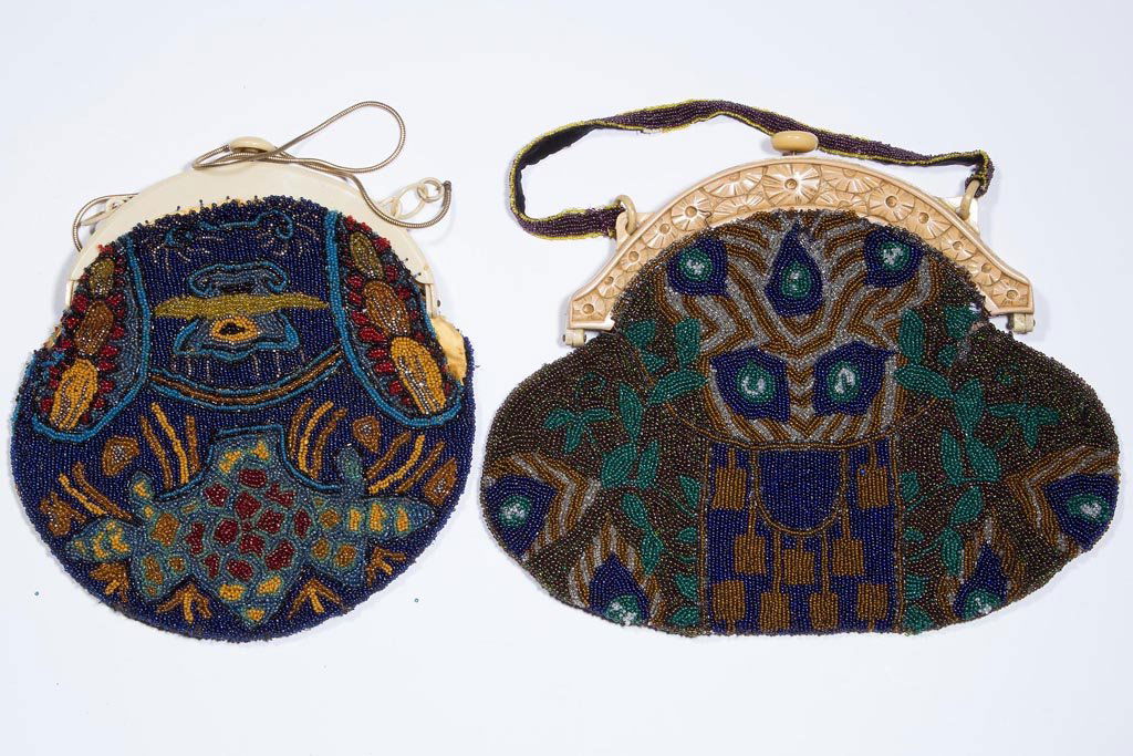 VINTAGE LADY'S BEADED PURSES, LOT OF TWO: VINTAGE LADY'S BEADED PURSES, LOT OF TWO, each with a celluloid frame, bright polychrome design, original strap and lining. First half 20th century. 7 1/2" x 8 1/4" and 10 1/4" x 8 3/8". Provenance: F