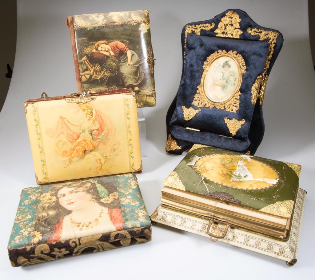 VICTORIAN CELLULOID PHOTO ALBUMS, LOT OF FIVE: VICTORIAN CELLULOID PHOTO ALBUMS, LOT OF FIVE, each with cloth backing and gold-tone metal catches, including one with photos marked "Wm. Dean, / PHOTOGRAPHY / HARRISONBURG, VA." and a blue stand-up e