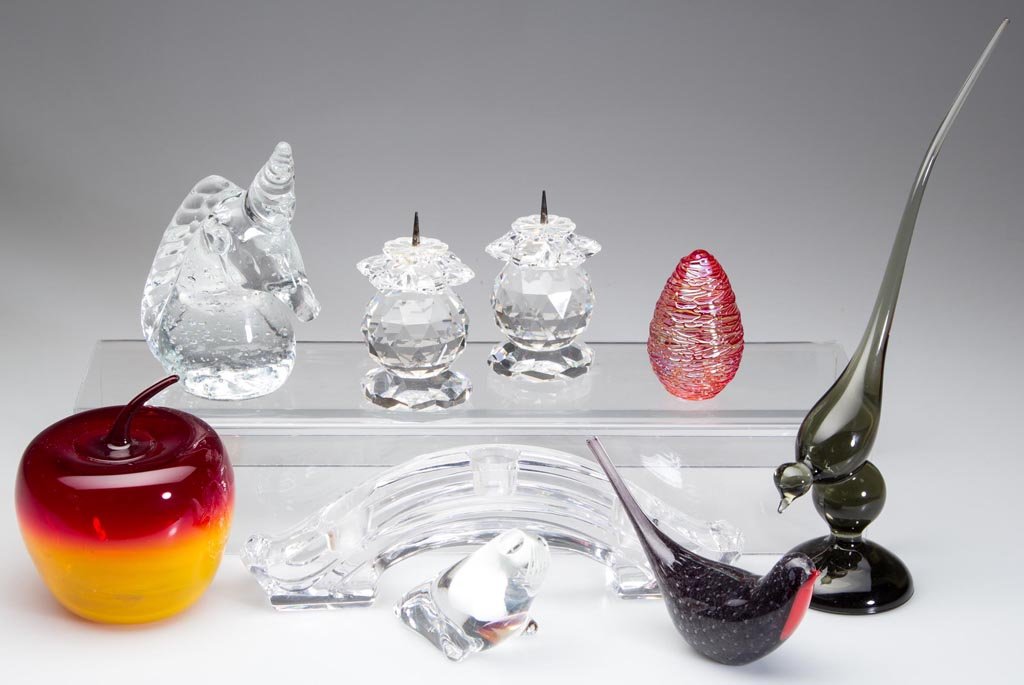 ASSORTED GLASS PAPERWEIGHTS AND OTHER RELATED ARTICLES,: ASSORTED GLASS PAPERWEIGHTS AND OTHER RELATED ARTICLES, LOT OF NINE, including marked Blenko, Kosla and Spode paperweights and two Swarovski pricket-style candle holders. 20th century. 2 1/2" to 11" H