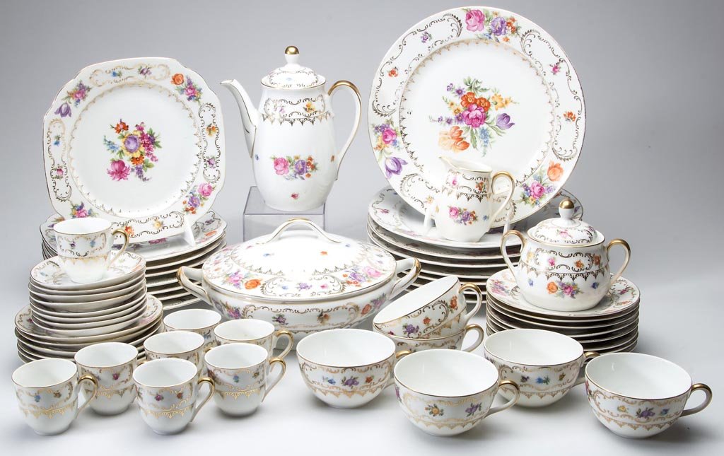 BAVARIA "WINTERLING" DINNER SERVICE: BAVARIA "WINTERLING" DINNER SERVICE, white ground with multi-colored floral sprays and gilt decoration, 56 pieces comprising eight 10" D dinner plates, eight 6" D bread and butter plates, eight 8" oct