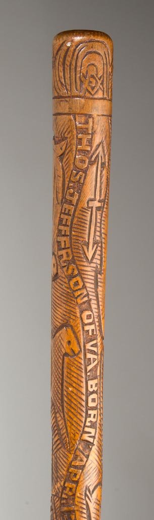 THOMAS JEFFERSON CRADDOCK, ALBEMARLE CO., VIRGINIA: THOMAS JEFFERSON CRADDOCK, ALBEMARLE CO., VIRGINIA CARVED FOLK ART CANE / WALKING STICK, maple, a fine example with elaborate carving featuring Masonic symbols, arrows, fish, and other figures, and nu