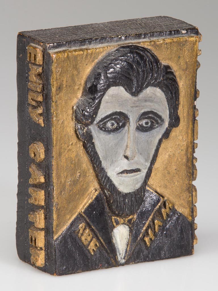 AFRICAN AMERICAN HIGHLAND CO., VIRGINIA PAINTED FOLK: AFRICAN AMERICAN HIGHLAND CO., VIRGINIA PAINTED FOLK ART CARVING, oak, the front depicting a bust portrait, relief-carved, of Abraham Lincoln with characteristic beard and "Abe / Ham" at bottom. "Emil