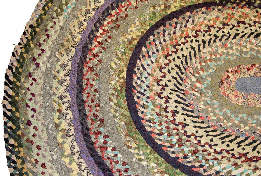 AMERICAN WOVEN BRAIDED ROOM-SIZE RUG: AMERICAN WOVEN BRAIDED ROOM-SIZE RUG, multi-color oval form. Second half 20th century. 7' 8" x 6'. Provenance: Collection of the late John and Lil Palmer, Purcellville, VA.